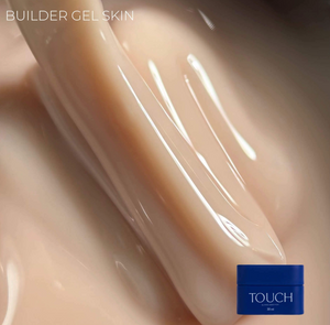 Close-up of Builder Gel Skin with a blue jar labeled 'TOUCH' on a beige background.