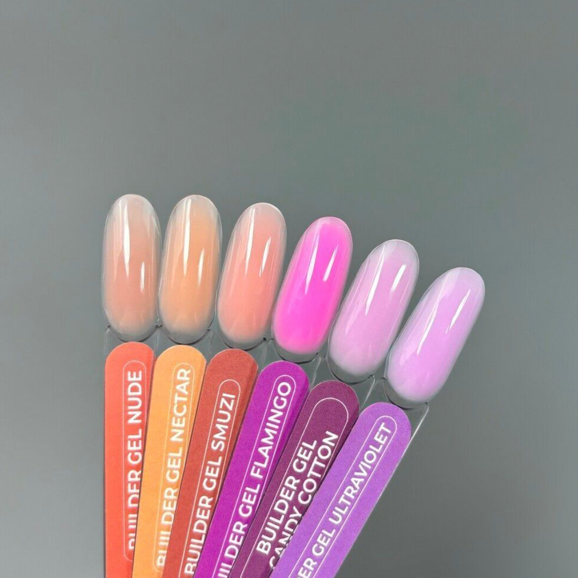TOUCH Builder Gel Yogurt swatches in light pink and sand tones on gray background