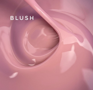 Close-up of light pink TOUCH Cover Base Delicate showing creamy texture and glossy finish