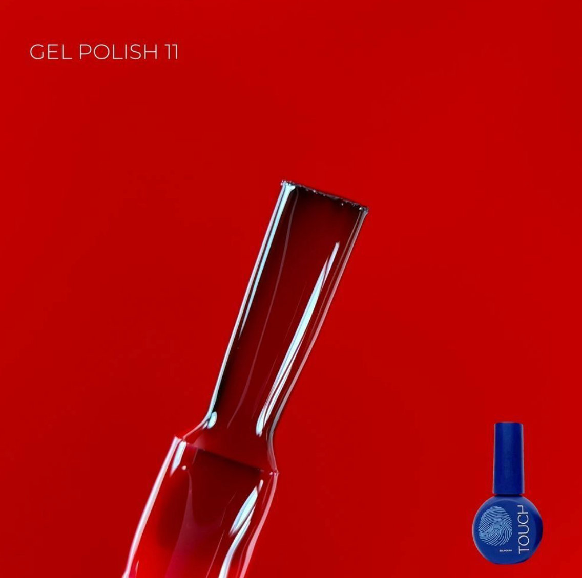 Red gel polish bottle with a small bottle of blue gel polish on a red background