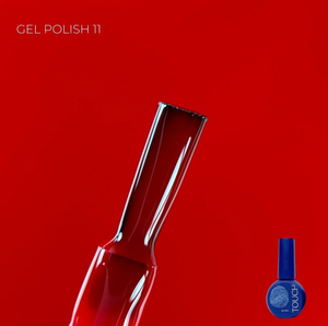 Red gel polish bottle with a small bottle of blue gel polish on a red background