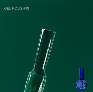 Green gel polish bottle with a smaller blue bottle labeled 'TOUCH' on a dark green background.