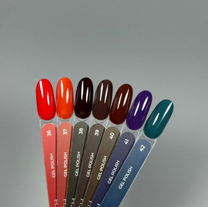 Set of gel nail polish samples with color swatches on a gray background