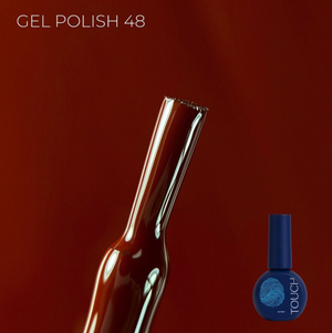 TOUCH Gel Polish 46 bottle on deep red background showing metallic finish and elegant design